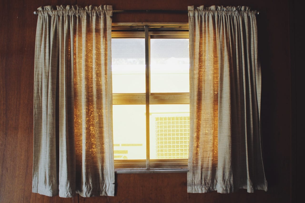 residential-window-with-curtains