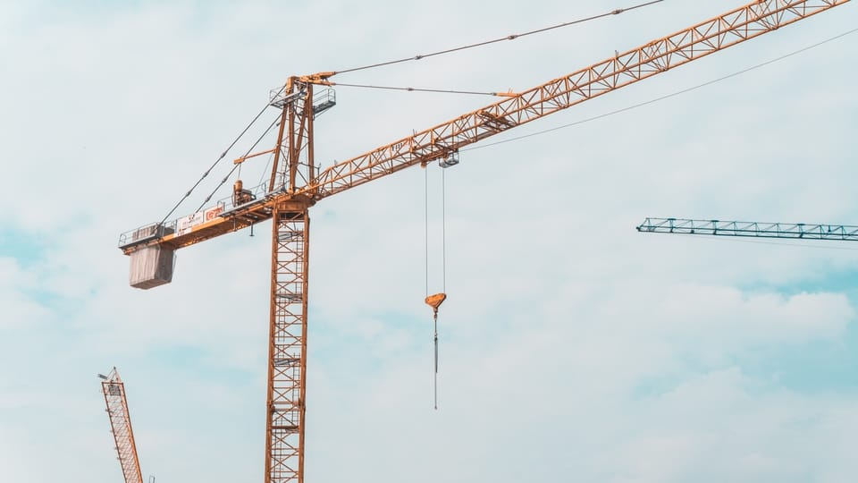 construction-crane-againt-sky-background