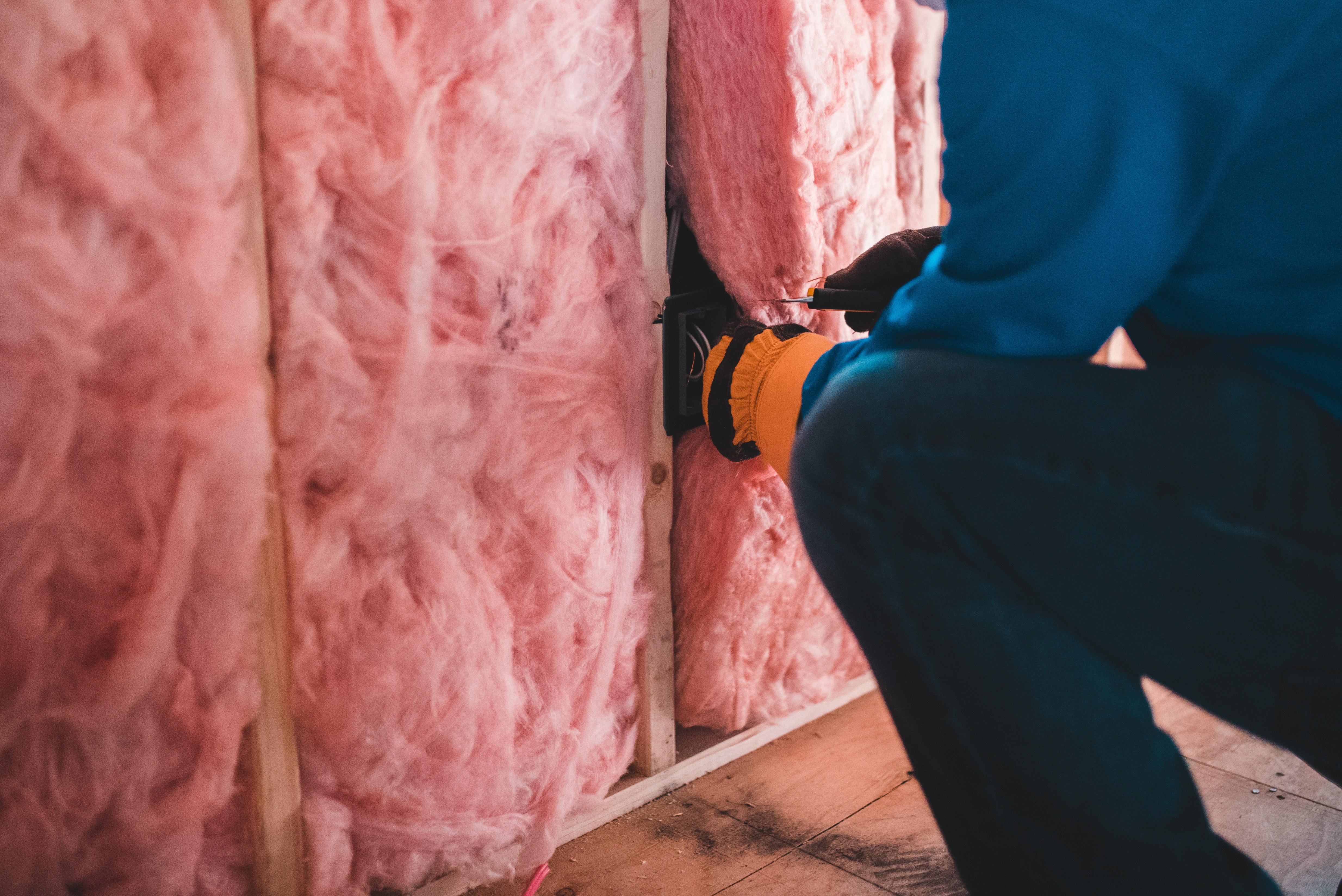 person-installing-insulation